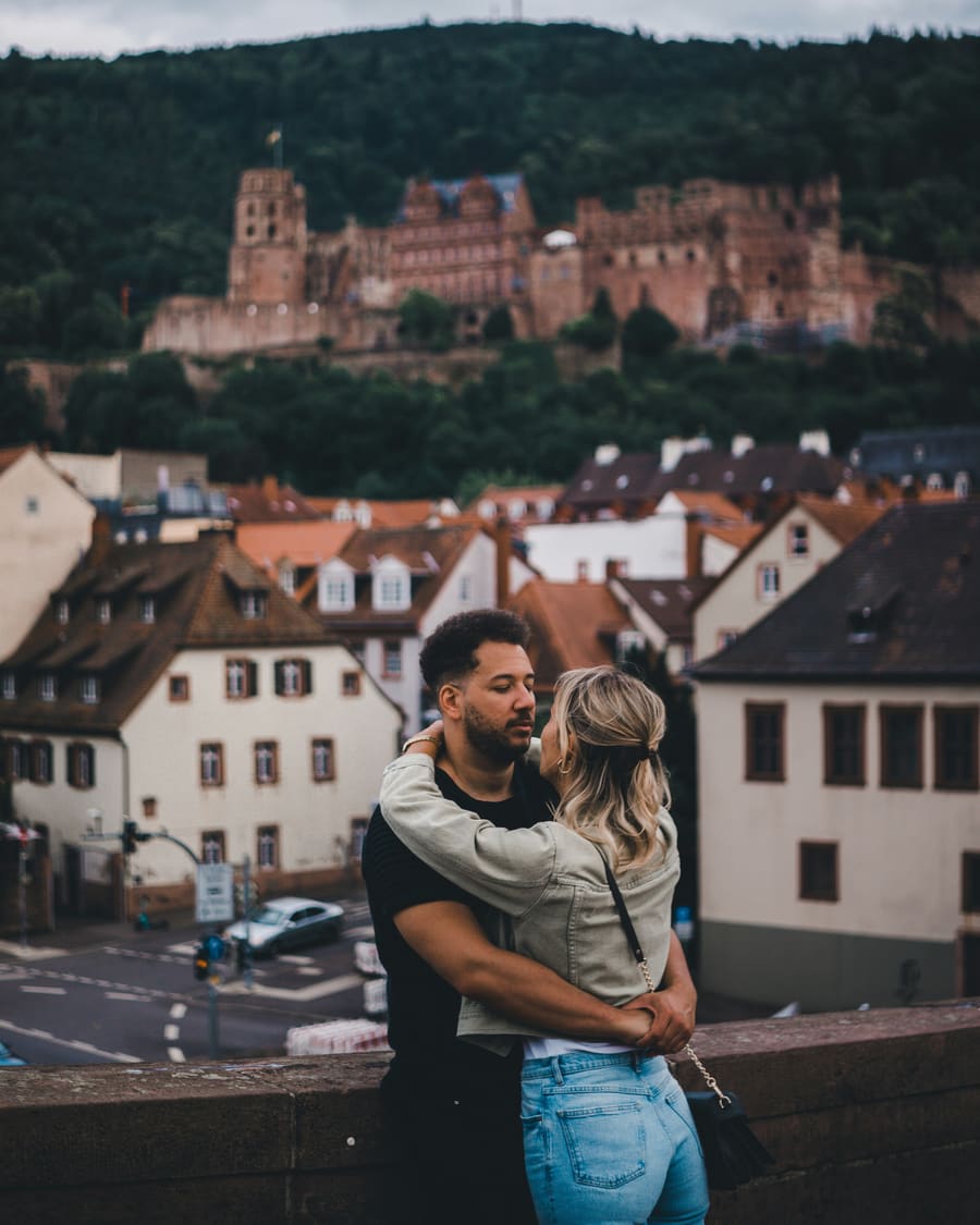 A woman and her companion sharing an outdoor travel moment.